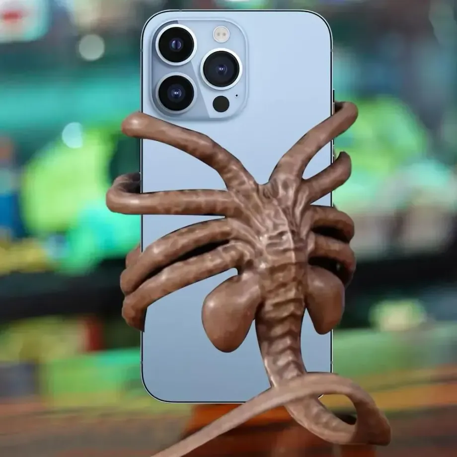 Držák na telefon Facehugger ve tvaru mimozemšťana s kreativním designem