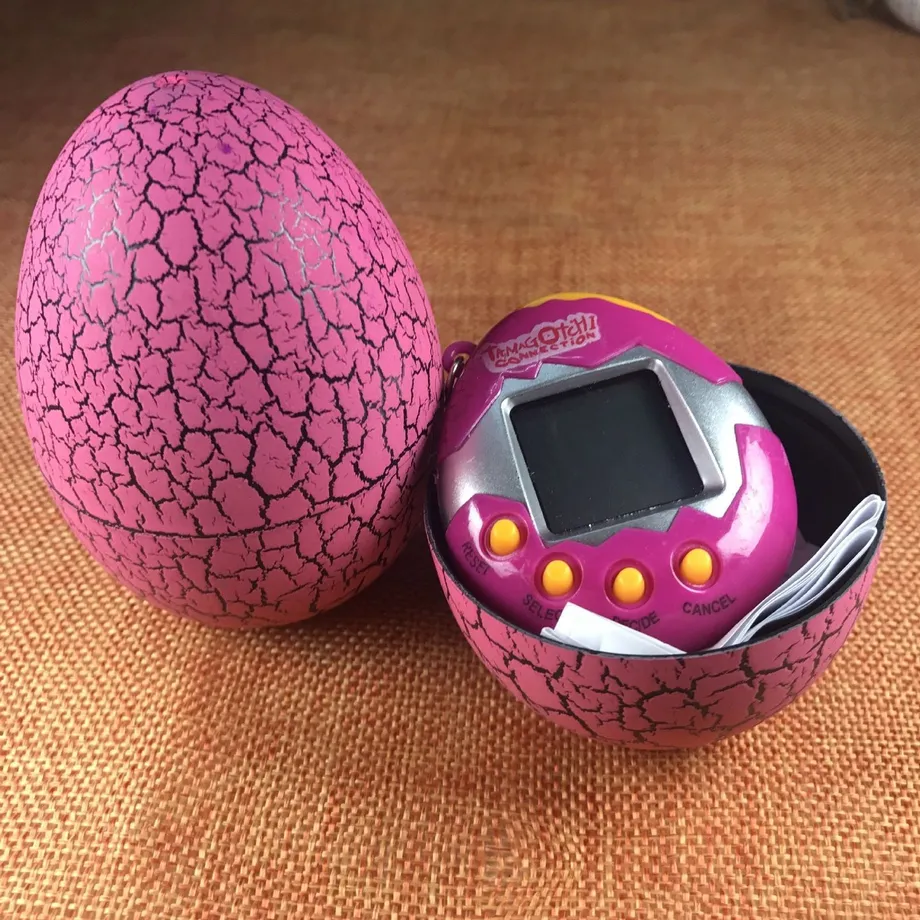 Dětská retro hračka Tamagotchi v dinosauřím vejci